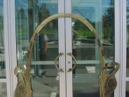 Cranes on entrance door by Mooserun Metalsmiths