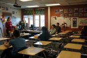 City Manager Katie Koester presents information about public service careers at Homer High School.