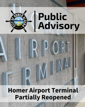 Homer Airport Terminal lettering on building with Public Advisory saying terminal is partially reopened