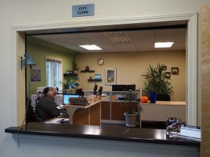 View into the City of Homer City Clerk's Office from the customer counter.