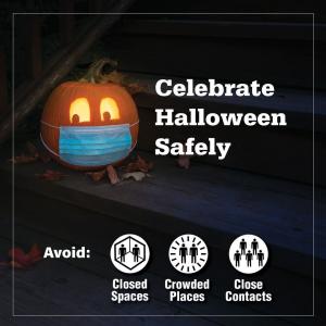 Jack-o-lantern wearing blue face covering.