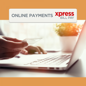 Close up of a hand holding a credit card and the words Xpress Bill Pay above them
