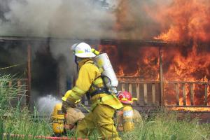 Homer Volunteer Fire Fighter working active blaze.