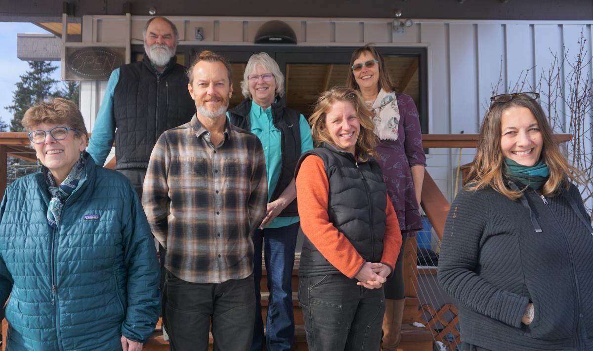 Group photo of Homer City Council members and Mayor on steps in front of the Pratt Museum and Park.