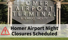 A large sign for the Homer Airport Terminal, with text reading Public Advisory Homer Airport Night Closures Scheduled.