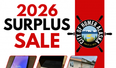 2026 Surplus Sale with the City of Homer ship's wheel logo and photos of six items in the sale, electronics, shed and equipment