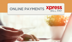 Close up of a hand holding a credit card and the words Xpress Bill Pay above them
